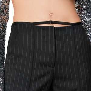 Pinstriped trousers with hook at the waist