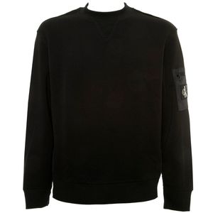 Black sweater with technical fabric inserts