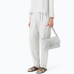 High-waisted trousers with pleats in techno cady