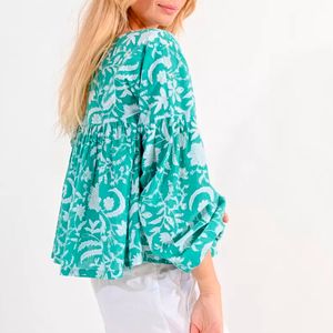 Turquoise blouse with printed pattern and V-neck