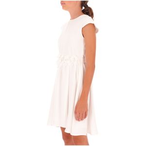 White dress with flower-decorated belt
