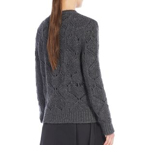 Simpaty all-over perforated sweater