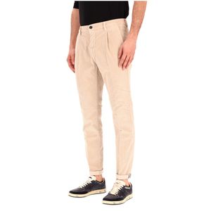 Pantalone in velluto con zip e bottone
