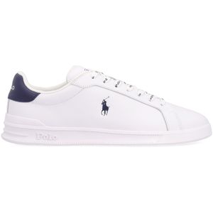 White sneakers with navy blue pony