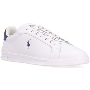White sneakers with navy blue pony