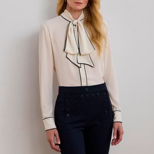 Camicia in georgette con fiocco bianco