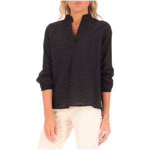 Maglia nera in cotone con fantasia floreale