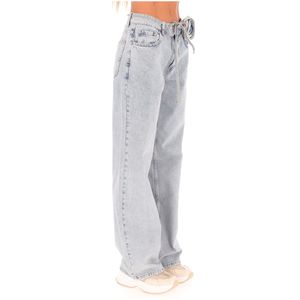 Jeans baggy con fiore in denim