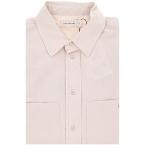 Camicia beige in cotone con tasche