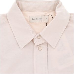 Camicia beige in cotone con tasche