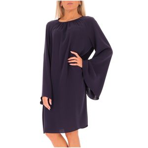 Elegant dress Madia with large volumes