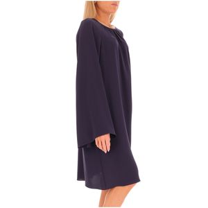 Elegant dress Madia with large volumes