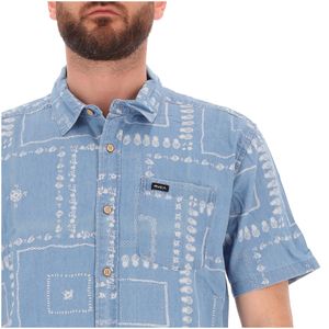 Blue short-sleeved shirt with all-over pattern