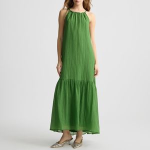 Long green dress with round neckline