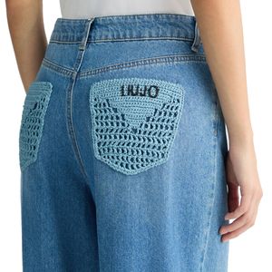 Jeans flare a vita alta in denim stretch