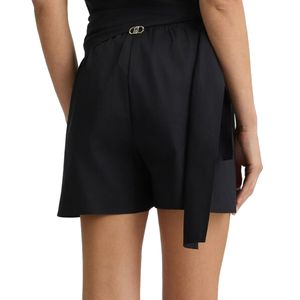 Shorts copricostume con fiocchetti