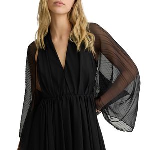 Pleated ceremonial cape