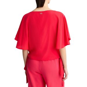 Blusa copricostume con fiocchi