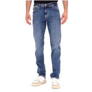 Faded jeans with logo pin