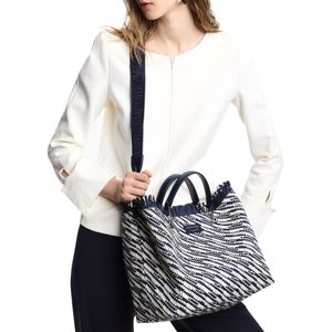 White and blue woven fabric bag with fringes