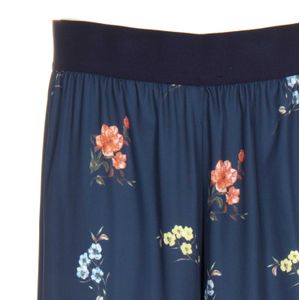 Blue trousers with floral texture