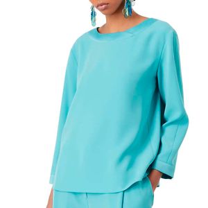 Solid color blouse with satin inserts