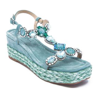 Suede sandal with maxi stones and rhinestones